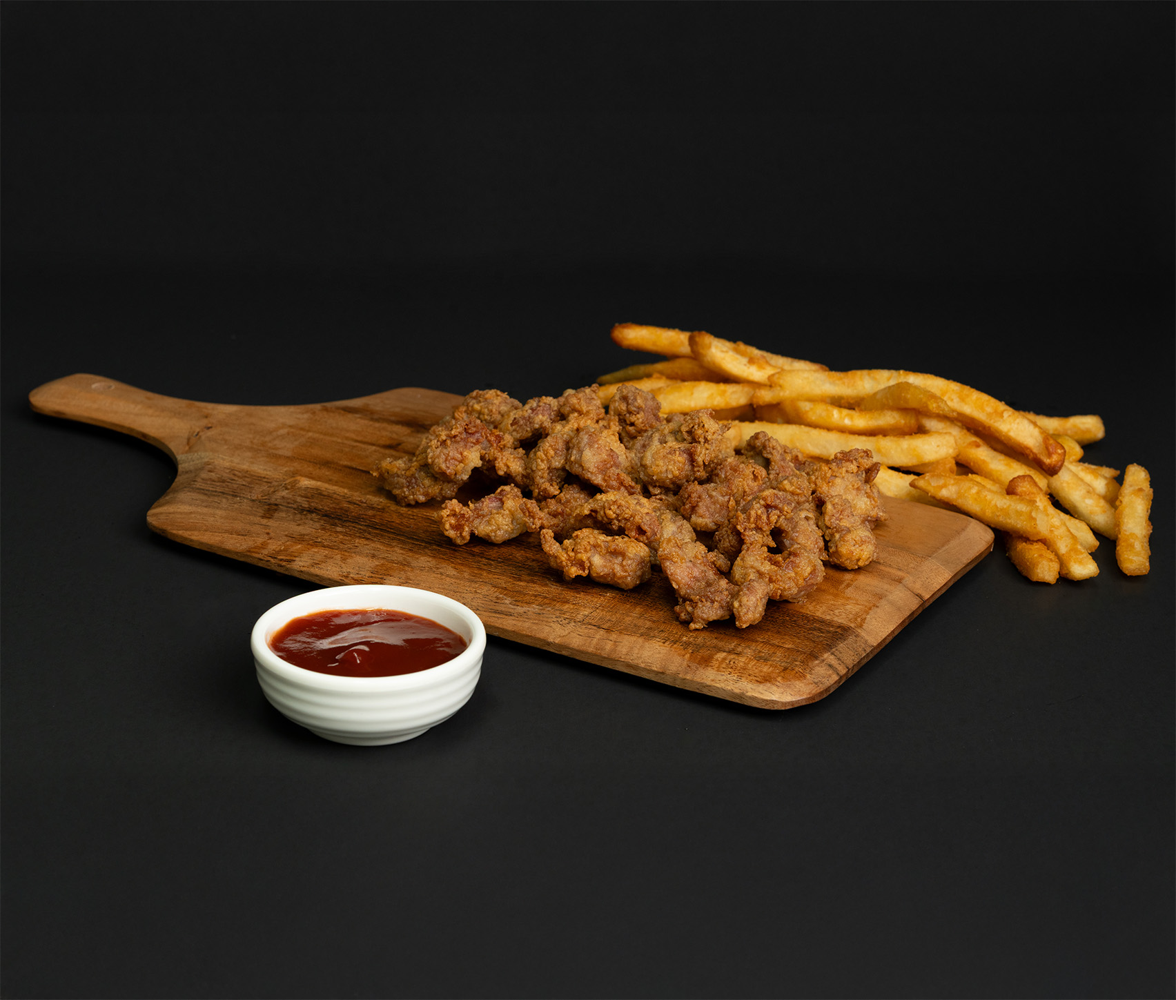 Delicious JJ Fish & Chicken meal featuring crispy fried chicken wings and fresh seafood